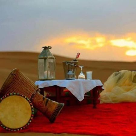 Unique Sahara Camp Hotel Merzouga Bagian luar foto